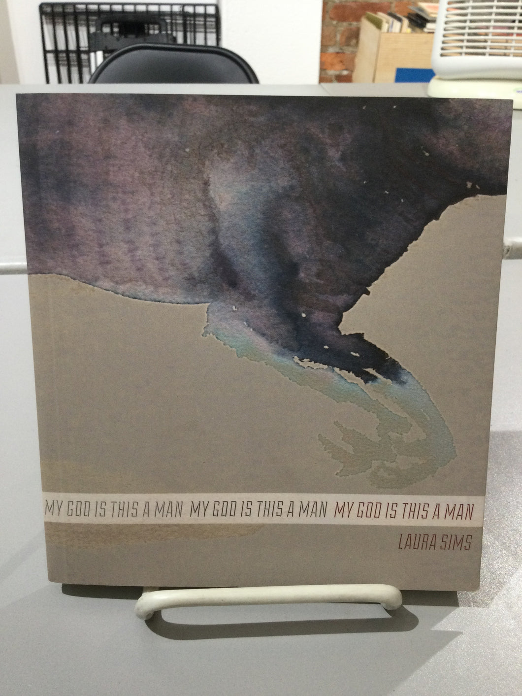 Sims, Laura: My god is this a man [used paperback]