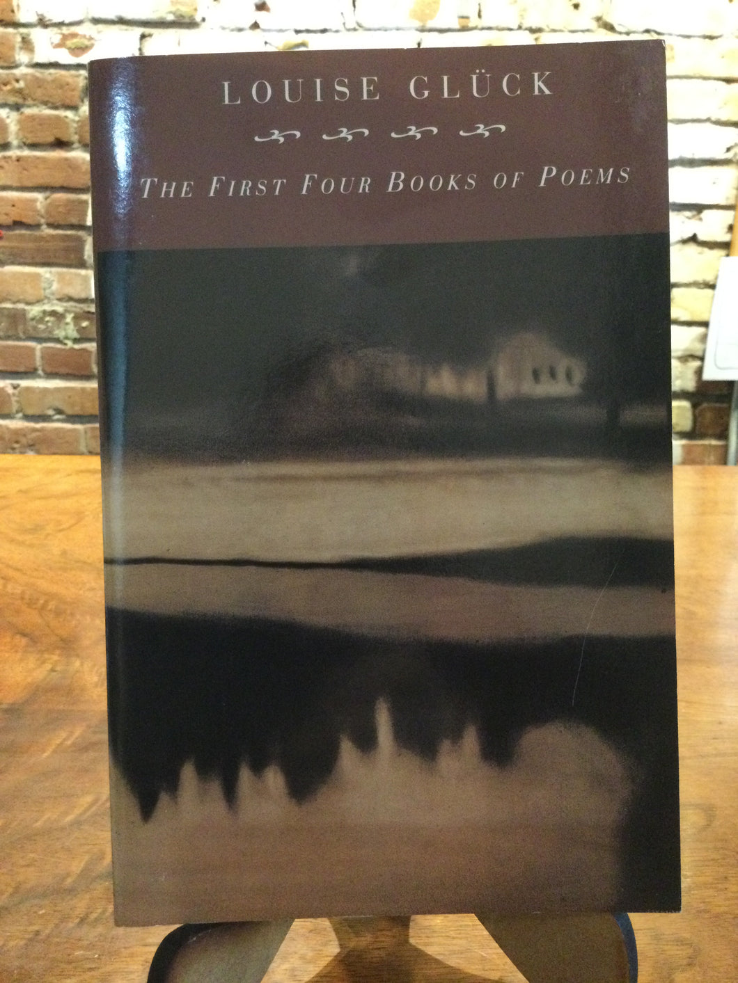 Gluck, Louise: The First Four Books of Poems [used paperback]