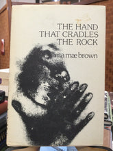 Brown, Rita Mae: The Hand That Cradles the Rock [used paperback]