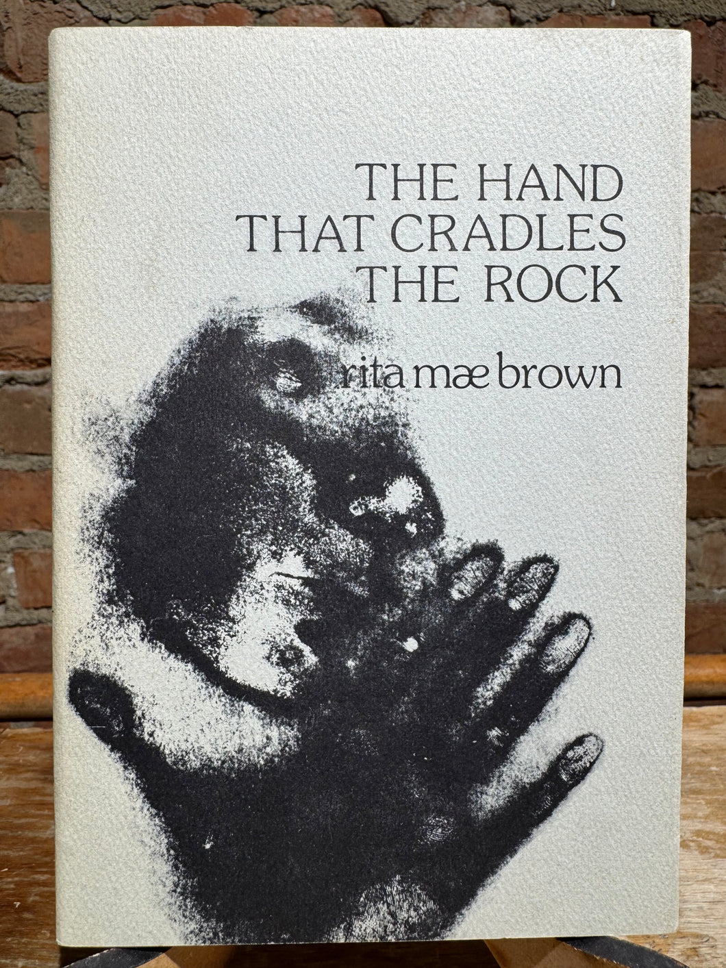 Brown, Rita Mae: The Hand that Cradles the Rock [used paperback]