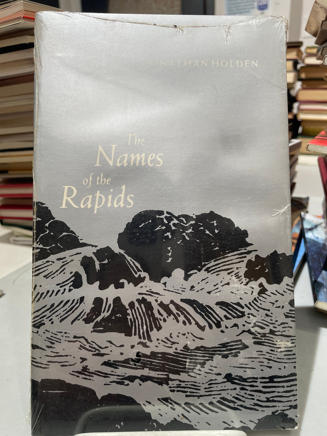 Holden, Jonathan: The Names of the Rapids [used paperback]